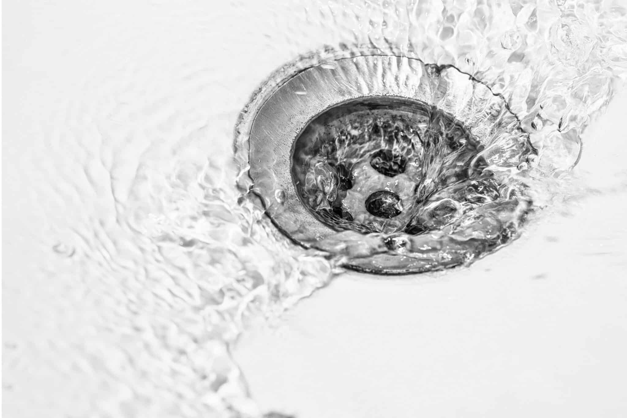 Water flowing down a sink drain
